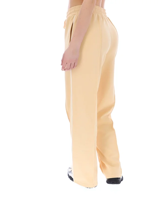 Pantaloni da tuta Marina a gamba larga in beige classico
