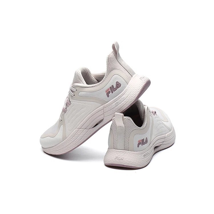 Scarpe da allenamento basse da atletica rosa