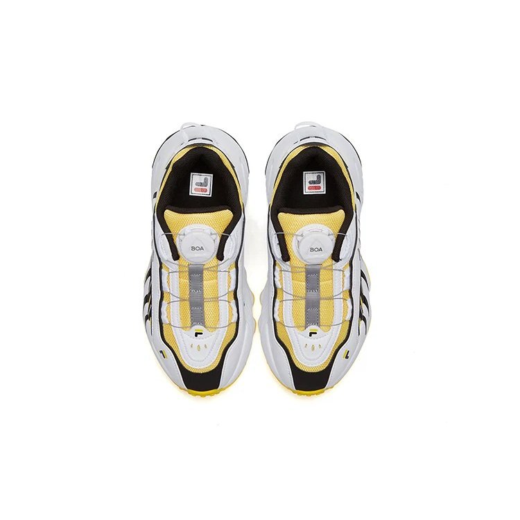 Sneakers basse vintage "Bianco Giallo Nero"